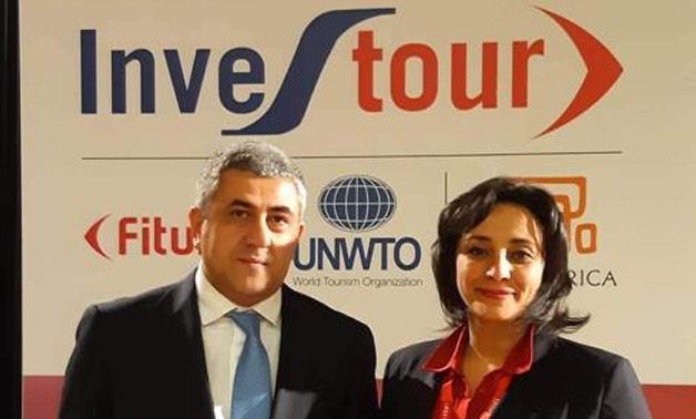 Egyptian Vice-Minister for Tourism and Antiquities Ghada Shalaby (R) and head of Egyptian Tourism Agency Ahmed Youssef (L) in the FITUR Madrid 2020- press photo.