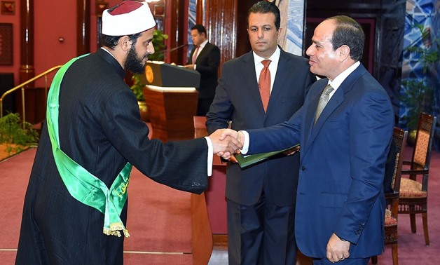FILE - During the ceremony, President Sisi honored 10 of the Quran reciters from many countries - Sherif Abdel Moneim, June, 2018