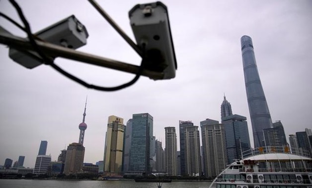 FILE PHOTO: Surveillance cameras are seen at Lujiazui financial district of Pudong, Shanghai, China January 15, 2020. REUTERS/Aly Song
