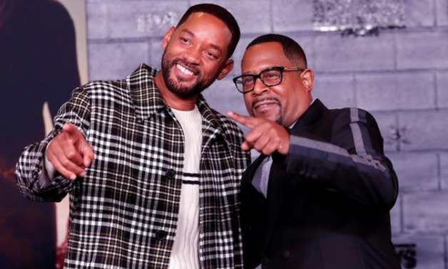 FILE PHOTO: Cast members Will Smith (L) and Martin Lawrence pose at the premiere of "Bad Boys for Life" in Los Angeles, California, U.S., January 14, 2020. REUTERS/Mario Anzuoni/File Photo