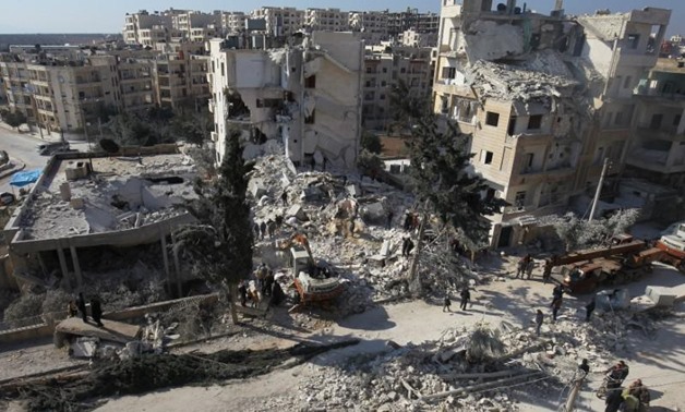 FILE PHOTO: People inspect the damage at a site hit by airstrikes in the rebel-held city of Idlib, Syria February 7, 2017. REUTERS/Ammar Abdullah