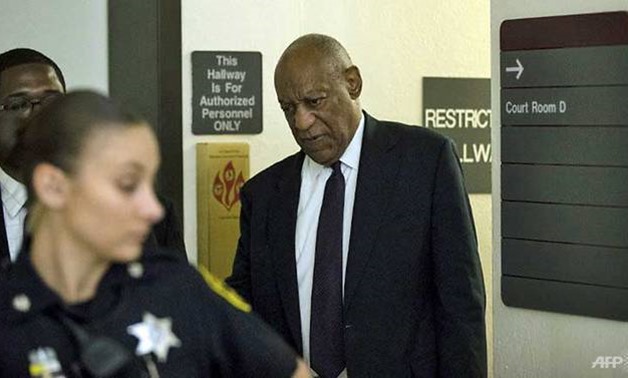 Bill Cosby walks to the courtroom during a break at his sexual assault trial at the Montgomery County Courthouse in Norristown, Pennsylvania - AFP/Matt Rourke/POOL