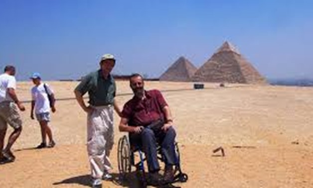 Disabled individual visiting the Great Pyramids of Giza - Egypt Travel