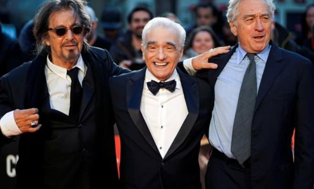 FILE PHOTO: Director Martin Scorsese and cast members Al Pacino and Robert De Niro pose as they arrive for the screening of "The Irishman" during the 2019 BFI London Film Festival at the Odeon Luxe Leicester Square in London, Britain October 13, 2019. REU