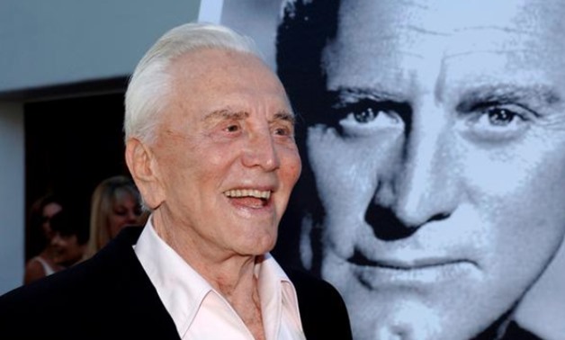 FILE PHOTO: Actor Kirk Douglas arrives to receive an inaugural award for Excellence in film presented by the Santa Barbara International Film Festival at a black-tie gala fundraiser in his honor at the Bacara Resort & Spa in Santa Barbara, California, Jul