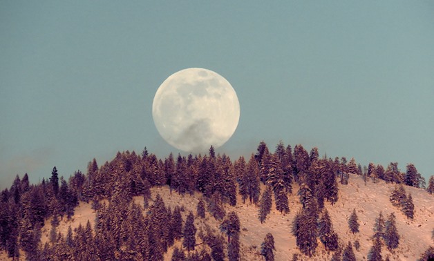 Snow Moon rising at Sunset- CC via Flickr/Rocky Raybell