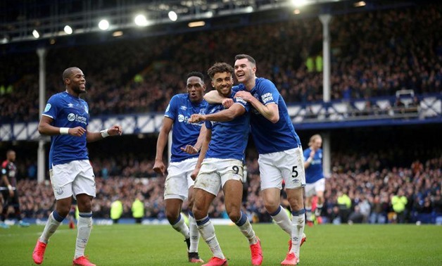 Everton's Dominic Calvert-Lewin celebrates scoring their third goal with Djibril Sidibe, Michael Keane and Yerry Mina. Action Images via Reuters/Carl Recine
