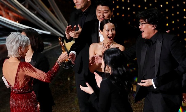 Kwak Sin Ae and Bong Joon Ho win Oscar for Best Picture for "Parasite" at the 92nd Academy Awards in Hollywood, Los Angeles, California, U.S., February 9, 2020. REUTERS/Mario Anzuoni
