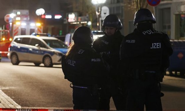 Police officers secure the area after a shooting in Hanau near Frankfurt, Germany. Photograph: Kai Pfaffenbach/Reuters