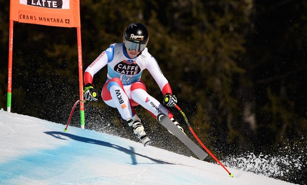 Gut-Behrami doubles up as Suter claims downhill globe
