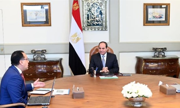 Meeting with Prime Minister Mostafa Madbouli and Environment Minister Yasmin Fouad, Sisi urged considering international standards and designs when formulating development projects for natural reserves - Press photo