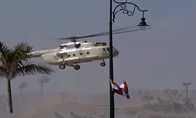 A helicopter transferring the body of former president Mohamed Hosni Mubarak who passed away on Tuesday at the age of 91 - State TV