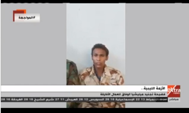 Screen shot from Extra News revealing the involvement of the Libyan Government of National Accord(GNA) led by Fayez al-Sarraj in recruiting African workers to fight against the Libyan National Army(LNA)