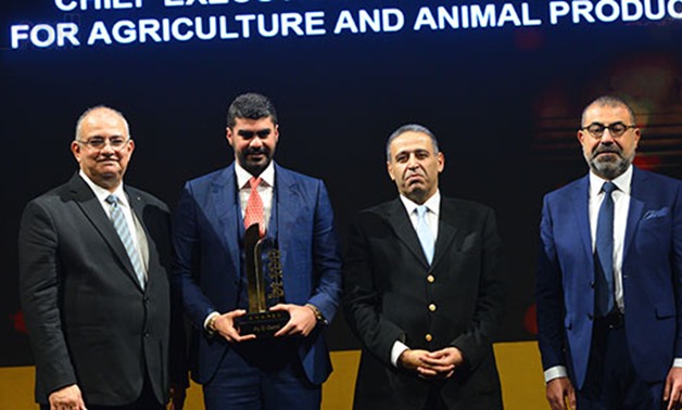 Mr. Aly El Gamil, chief Executive officer of Cairo 3A for Agriculture and Animal Production, receiving the bt100 Award for economic achievements - Egypt Today