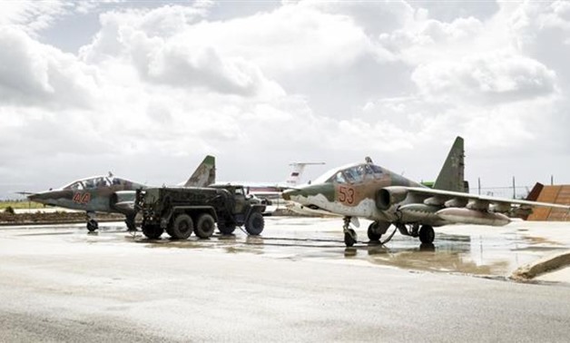 Russian Sukhoi Su-25 fighter jets are shown shortly before takeoff at Hmeimim air base in Syria. (Photo by Reuters)

