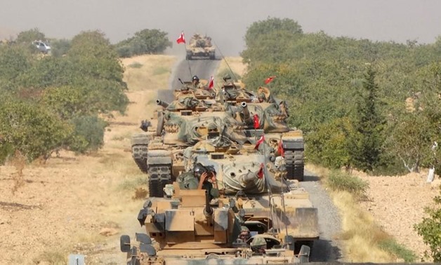 Turkish army tanks make their way towards the Syrian border town of Jarablus, Syria August 24, 2016. Revolutionary Forces of Syria Media Office/Handout via REUTERS