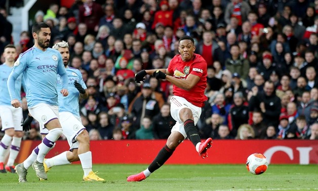 Soccer Football - Premier League - Manchester United v Manchester City - Old Trafford, Manchester, Britain - March 8, 2020 Manchester United's Anthony Martial scores their first goal Action Images via Reuters/Carl Recine

