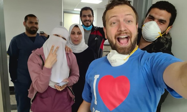 On his Twitter account, Swider posted a picture of him wearing an “I Love Egypt” t-shirt, and standing with Egyptian doctors - Swider's Twitter account