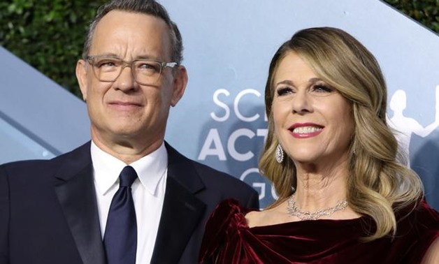 FILE PHOTO: 26th Screen Actors Guild Awards - Arrivals - Los Angeles, California, U.S., January 19, 2020 - Tom Hanks and Rita Wilson. REUTERS/Monica Almeida/File Photo.