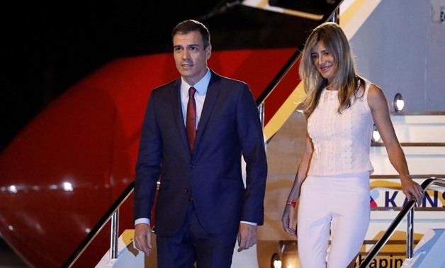 FILE PHOTO: Spain's Prime Minister Pedro Sanchez and his wife Maria Begona Gomez Fernandez arrive ahead of the G20 leaders summit in Osaka, Japan June 27, 2019. REUTERS/Jorge Silva/File Photo
