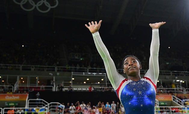 Four-time Olympic gold medallist Simone Biles was to have featured in next month's event. (AFP)
