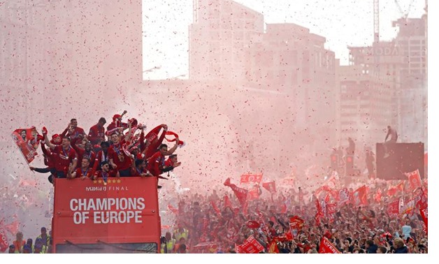 Liverpool's team bus travels past fans during the team's Champions League victory parade in Liverpool, Britain, June 2, 2019. REUTERS/Phil Noble