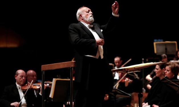 FILE PHOTO: Polish composer Krzysztof Penderecki conducts the Israel Philharmonic Orchestra during a performance of his Polish Requiem in Tel Aviv February 12, 2014. REUTERS/Finbarr O'Reilly/File Photo