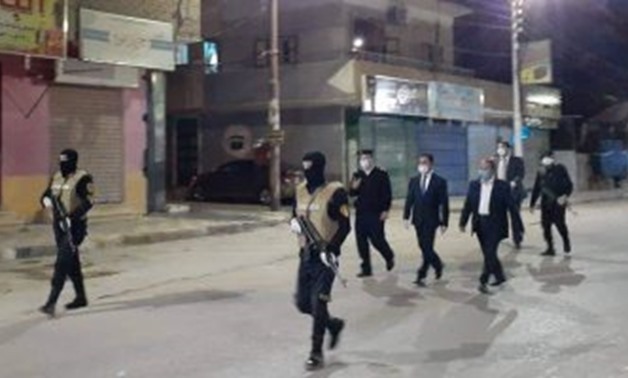 Egyptian police patrolling streets during curfew imposed as a protective measure against the spread of COVID-19 - Egypt Today