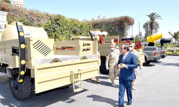 President Abdel Fattah El Sisi on Tuesday inspected the Armed Forces equipment, elements and teams assisting the state civil sector in combating the outbreak of the novel coronavirus contagion - Press Photo