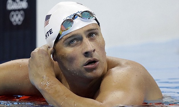Ryan Lochte (above at the Olympics) said he is considering checking in to rehab - AFP