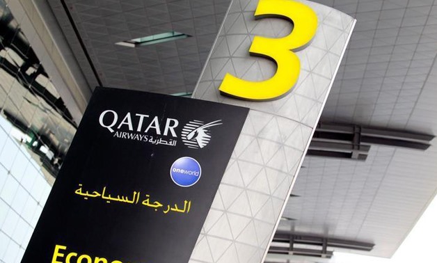 A sign of Qatar Airways is seen at Hamad International Airport - REUTERS/Naseem Zeitoon