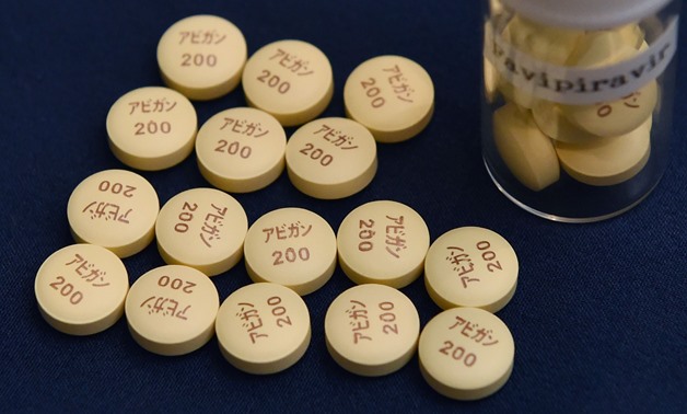 In this file photo taken on October 22, 2014 anti-influenza Avigan tablets produced by Japan's Fujifilm are displayed in Tokyo. (AFP Photo) 