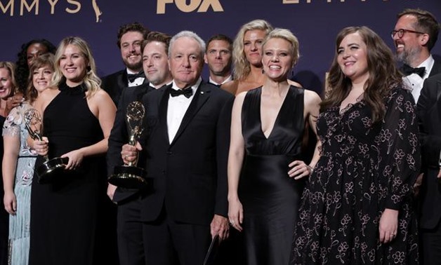 FILE PHOTO: 71st Primetime Emmy Awards - Photo Room – Los Angeles, California, U.S., September 22, 2019 - The cast of Saturday Night Live poses backstage with their award for Outstanding Variety Sketch Series. REUTERS/Monica Almeida/File Photo.