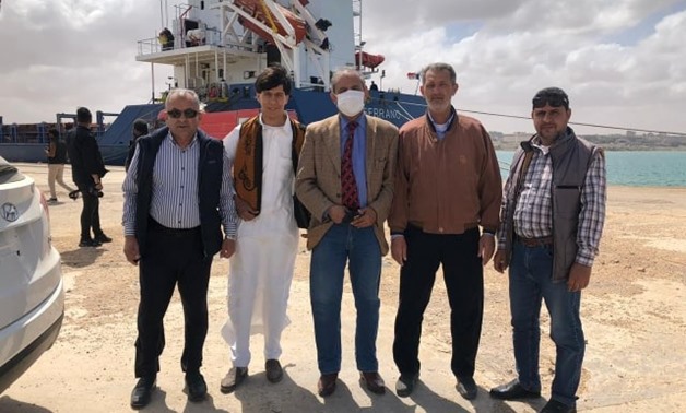 Libyans receive 44 containers of detergents sent by Egypt upon arrival in Tobruk Port on April 11, 2020 – Press Photo 