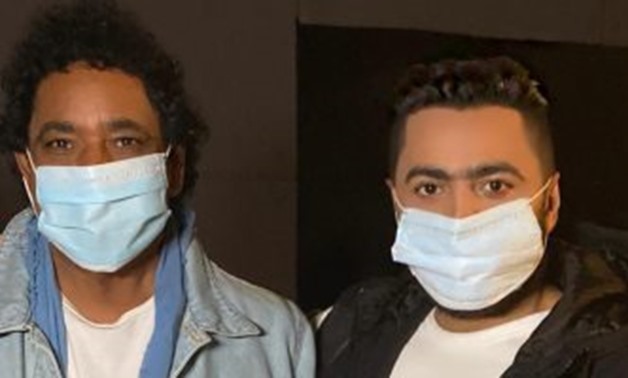 File - Mohamed Mounir and Tamer Hosny.