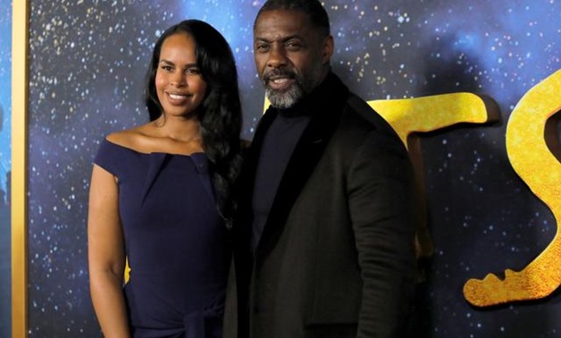 FILE PHOTO: Actor Idris Elba (R) and his wife Sabrina Dhowre Elba (L) arrive for the world premiere of the movie "Cats" in Manhattan, New York, U.S., December 16, 2019. REUTERS/Andrew Kelly.