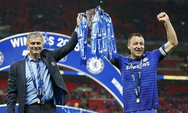Football - Chelsea v Tottenham Hotspur - Capital One Cup Final - Wembley Stadium - 1/3/15 Chelsea's manager Jose Mourinho and John Terry pose with the Capital One Cup Action Images via Reuters / John Sibley Livepic
