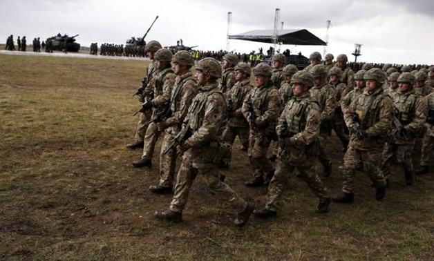FILE PHOTO: British soldiers attend welcoming ceremony for U.S.-led NATO troops at polygon near Orzysz, Poland, April 13, 2017. REUTERS/Kacper Pempel
