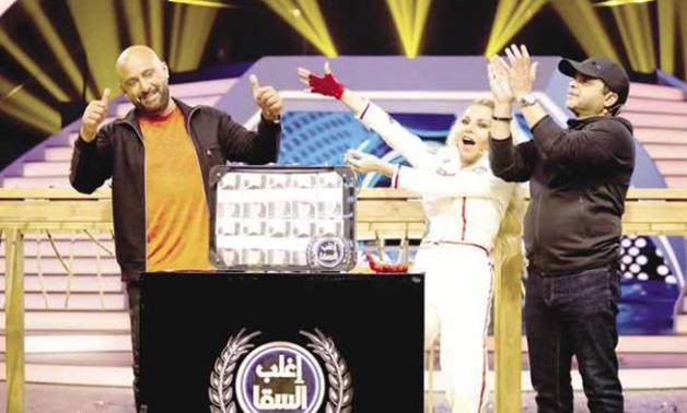 Ahmed el-Sakka [left] in one of the episodes of “Eghleb el-Sakka” presented by Razan Maghrabi and competing with renowned comedian Heneidy - YouTube