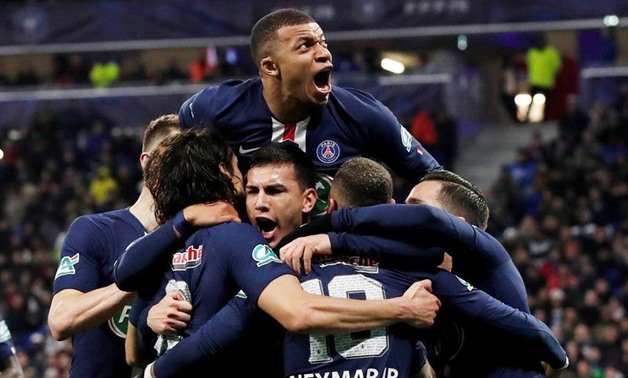 Paris St Germain's Kylian Mbappe and team mates celebrate their second goal, scored by Neymar from the penalty spot REUTERS/Benoit Tessier/File Photo
