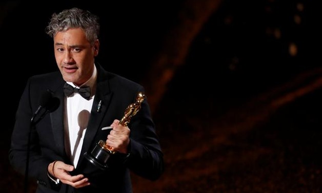 FILE PHOTO: Taika Waititi accepts the award for Best Adapted Screenplay for 'Jojo Rabbit' at the 92nd Academy Awards in Hollywood, Los Angeles, California, U.S., February 9, 2020. REUTERS/Mario Anzuoni/File Photo.