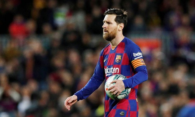 FILE PHOTO: Soccer Football - La Liga Santander - FC Barcelona v Real Sociedad - Camp Nou, Barcelona, Spain - March 7, 2020 Barcelona's Lionel Messi prepares to take a penalty REUTERS/Albert Gea