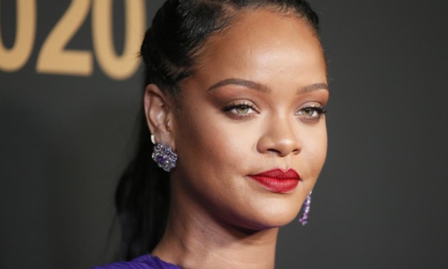 FILE PHOTO: 51st NAACP Image Awards – Photo Room– Pasadena, California, U.S., February 22, 2020 – Rihanna poses backstage with her President's award. REUTERS/Danny Moloshok