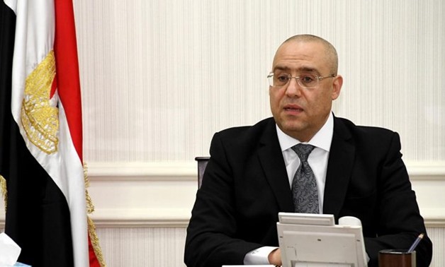 FILE - Housing Minister Assem el Gazzar