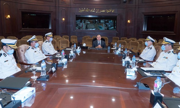 Minister of Interior Mahmoud Tawfiq during a meeting with his assistants and security men - Press Photo