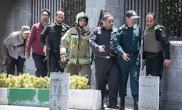 Members of Iranian forces are seen during an attack on the Iranian parliament in central Tehran, Iran, June 7, 2017. Tasnim News Agency/Handout