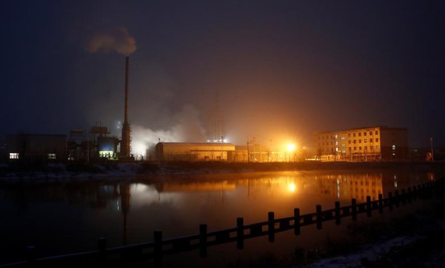 Steam and smoke rise from a factory in the Guantao Chemical Industry Park in the early morning near the villages of East Luzhuang and Nansitou, Hebei province, February 22, 2017. Picture taken February 22, 2017 - REUTERS
