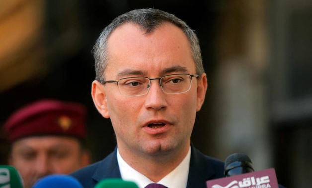 FILE - UN Middle East envoy Nickolay Mladenov is seen talking to press in Najaf, Iraq on March 3, 2015 (Reuters)
