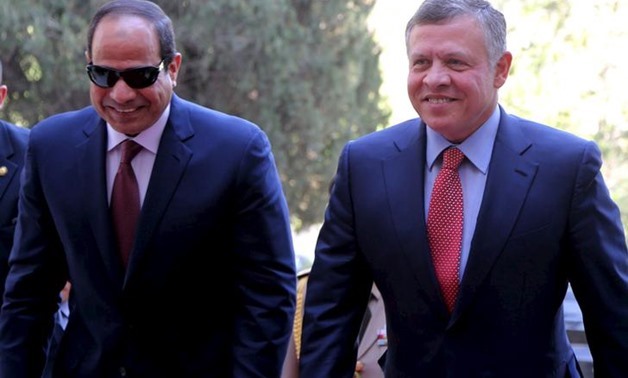 FILE - Jordan's King Abdallah II walks with Egypt's President Abdel Fattah El-Sisi in Amman, Jordan. (Reuters)