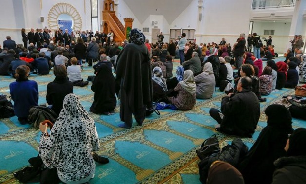 Several hundred people, Muslims and non-Muslims, gather to pray at the Grande Mosque in Lyon, France, November 15, 2015, for the victims of the series of shootings in Paris on Friday. REUTERS/Robert Pratta
